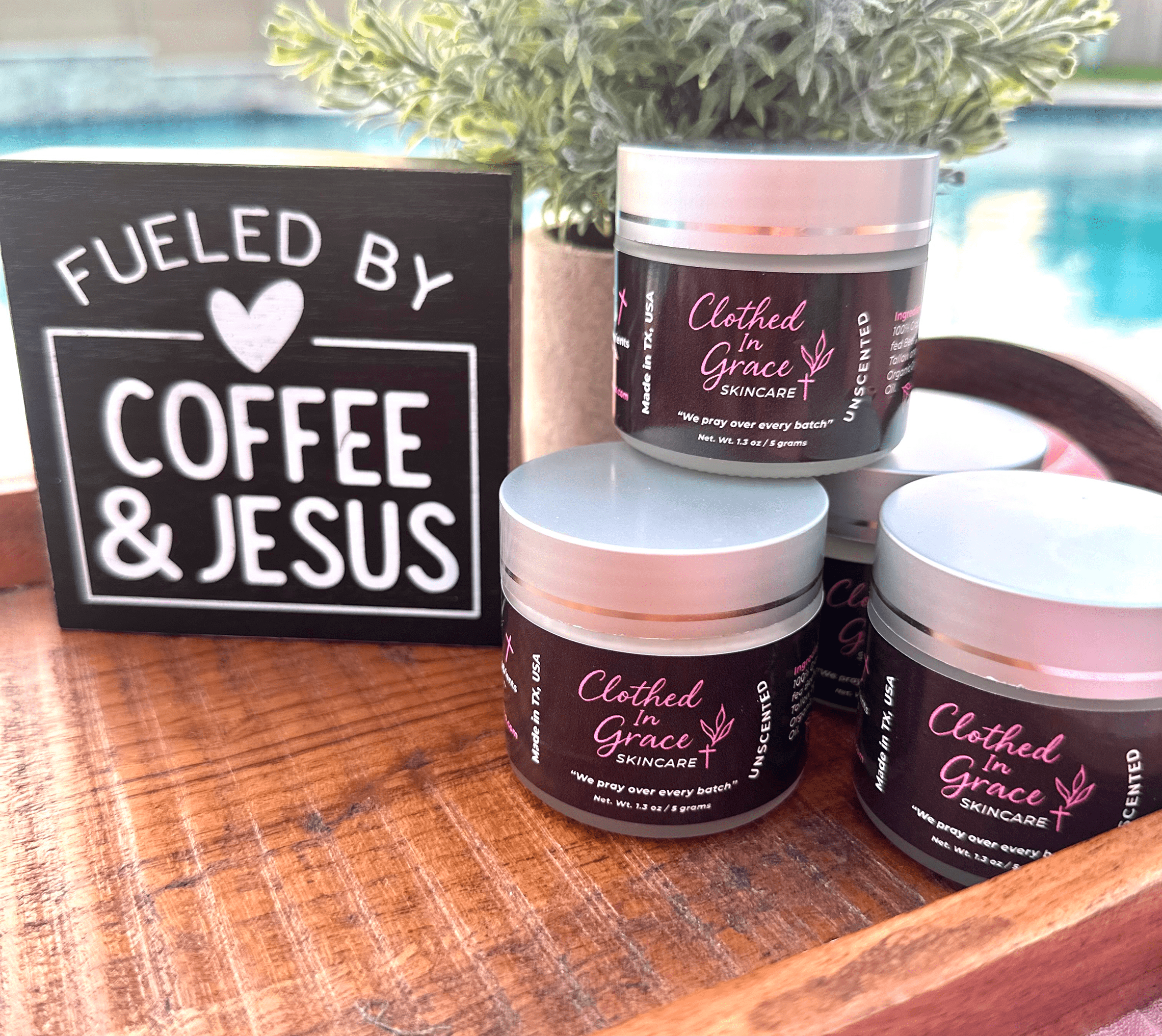 Skincare jars and motivational sign display.